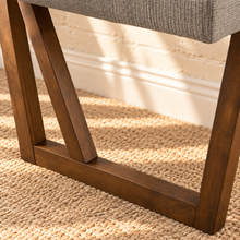 Load image into Gallery viewer, Jase ash grey upholstered dining bench with tufted backrest and walnut-finished geometric solid rubberwood legs.
