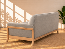 Load image into Gallery viewer, Image 4 of 5: Jules upholstered wooden sofa in Soft Ash with gray fabric, flared arms, contoured backrest, and solid Rubberwood frame

