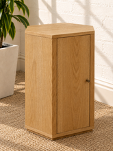 Load image into Gallery viewer, Kalel hexagonal oak side table with faceted wood veneer design, single cabinet door and interior shelf
