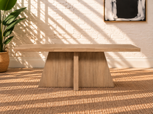 Load image into Gallery viewer, Kallie rectangular dining table in natural acacia wood with Brushed Smoke finish and sculptural intersecting panel base.
