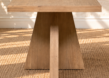 Load image into Gallery viewer, Kallie rectangular dining table in natural acacia wood with Brushed Smoke finish and sculptural intersecting panel base.
