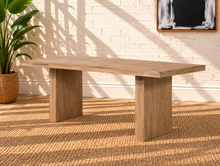 Load image into Gallery viewer, Kelly rectangular dining table in natural acacia wood with Brushed Smoke finish and two solid panel-style legs.
