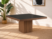 Load image into Gallery viewer, Kenji square dining table with inset black tempered glass top, walnut wood veneer border, and substantial square pedestal base.
