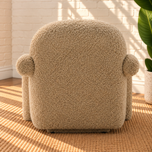 Load image into Gallery viewer, Kinsley latte beige textured upholstered accent chair with rounded back, cushioned seat and sculptural arms and legs.
