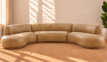 Load image into Gallery viewer, Image 2 of 5: Kirby 3-Piece curved sectional sofa in Saddle Tan vegan leather with rounded seating and curved Rubberwood base
