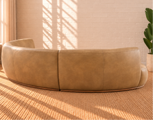 Load image into Gallery viewer, Image 4 of 5: Kirby 3-Piece curved sectional sofa in Saddle Tan vegan leather with rounded seating and curved Rubberwood base
