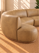 Load image into Gallery viewer, Image 5 of 5: Kirby 3-Piece curved sectional sofa in Saddle Tan vegan leather with rounded seating and curved Rubberwood base
