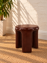 Load image into Gallery viewer, Image 3 of 5: Klarisse sculptural side table in chestnut high-gloss concrete with a rounded top and three curved integrated legs.

