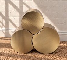 Load image into Gallery viewer, Klein three-piece Orbit nesting side tables in brushed gold with rounded cylindrical forms.
