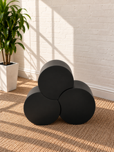 Load image into Gallery viewer, Klein three-piece Orbit nesting side tables in Midnight matte black with rounded cylindrical forms.
