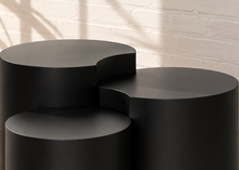 Load image into Gallery viewer, Klein three-piece Orbit nesting side tables in Midnight matte black with rounded cylindrical forms.
