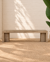 Load image into Gallery viewer, Kollie natural wood bench with long rectangular seat, waterfall-style ends and visible acacia wood grain.
