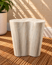 Load image into Gallery viewer, Laura Sculptural Side Table in Ivory Travertine with a three-lobed organic shape and ivory stone-effect finish.
