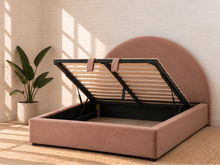 Load image into Gallery viewer, Laurane Queen Size platform bed in Blossom Pink with rounded arch headboard, upholstered frame, and lift-up underbed storage.
