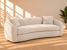 Load image into Gallery viewer, Image 2 of 5: Leighton upholstered sofa in Cloud Ivory fabric with rounded silhouette, sloped arms, broad bench seat, and black legs
