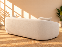 Load image into Gallery viewer, Image 5 of 5: Leighton upholstered sofa in Cloud Ivory fabric with rounded silhouette, sloped arms, broad bench seat, and black legs

