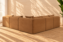 Load image into Gallery viewer, Leilani 5-piece L-shaped modular sectional sofa in warm caramel furry textured corduroy with plush channel detailing and loose back cushions.
