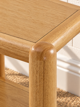 Load image into Gallery viewer, Lena natural oak side table with rounded wood posts, rectangular top and open lower storage shelf
