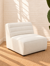 Load image into Gallery viewer, Image 3 of 5: Lorena 6-Piece sectional sofa in Snow Cream faux sheepskin fabric with channel tufted backrests and ottoman
