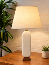 Load image into Gallery viewer, Image 2 of 6: Lumi Ivory Marble table lamp with off-white linen-textured shade, Walnut wood base, and brass detail
