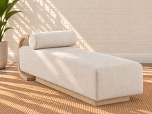 Load image into Gallery viewer, Lyca upholstered beige fabric chaise lounge with blonde oak frame, synthetic cane detailing, and curved Art Deco-inspired design
