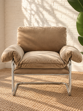 Load image into Gallery viewer, Mara camel velvet lounge chair with oversized padded cushions and polished chrome cantilever frame
