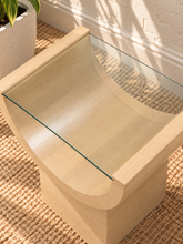Load image into Gallery viewer, Marcel Blonde Oak side table with curved oak veneer base and tempered glass top.
