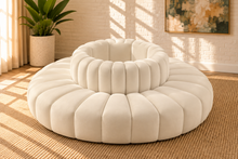 Load image into Gallery viewer, Marcy 8-piece round sectional sofa in Creamy White velvet with deep radial channel tufting and a 27-inch-diameter central circle.
