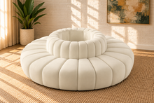 Load image into Gallery viewer, Marcy 8-piece round sectional sofa in Creamy White velvet with deep radial channel tufting and a 27-inch-diameter central circle.
