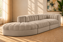 Load image into Gallery viewer, Maricon 3-piece modular sectional sofa in Ivory Beige velvet with deep channel tufting, curved chaise, rounded profile, and contemporary design.

