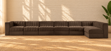 Load image into Gallery viewer, Maricon 7-piece modular sectional sofa in Cocoa Brown velvet with deep channel tufting, rounded cushions, and contemporary L-shaped configuration.
