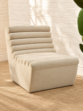 Load image into Gallery viewer, Marlowe lounge chair in bisque fleece with armless silhouette, deep seat, and rounded channel tufting across the seat and back
