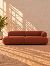 Load image into Gallery viewer, Image 1 of 4: Megan 2-Piece sectional sofa in Burnt Sienna chenille with bumper chaise configuration and rounded cushions
