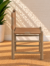 Load image into Gallery viewer, Meryll Natural Brown dining chair with vintage saddle brown vegan leather and solid walnut-finished wood frame

