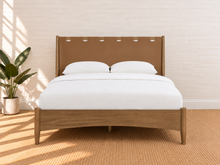 Load image into Gallery viewer, Meryll Queen-Size Bed in Toasted Camel vegan leather with Brown Walnut frame and Art Deco headboard
