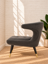 Load image into Gallery viewer, Image 3 of 4: Mirella upholstered lounge chair in Smoky Charcoal with sculptural back, plush seat, and brass-capped legs
