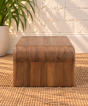 Load image into Gallery viewer, Molly natural brown mindi wood coffee table with rounded rectangular top and wide waterfall-style legs.
