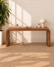 Load image into Gallery viewer, Molly minimalist desk table in natural brown mindi wood with rounded waterfall edges and a clean sculptural silhouette.

