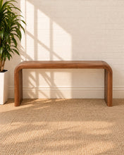 Load image into Gallery viewer, Molly minimalist desk table in natural brown mindi wood with rounded waterfall edges and a clean sculptural silhouette.

