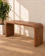 Load image into Gallery viewer, Molly minimalist desk table in natural brown mindi wood with rounded waterfall edges and a clean sculptural silhouette.

