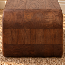 Load image into Gallery viewer, Montana natural brown mindi wood coffee table with a rectangular top, rounded corners, visible wood grain, and sculptural curved base.
