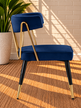 Load image into Gallery viewer, Morse dining chair in Royal Navy velvet with matte black metal legs and gold frame and leg tip details
