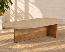 Load image into Gallery viewer, Myan freeform coffee table with beige travertine stone top and solid mango wood architectural base.
