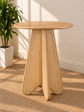 Load image into Gallery viewer, Nabi bar-height table in Blonde Oak with round wood top and sculptural natural cane-inset pedestal base.
