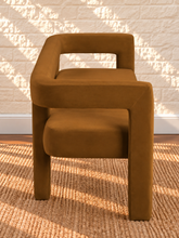 Load image into Gallery viewer, Navarro dining bench in Toasted Cognac velvet with sculptural open-back frame and upholstered seat
