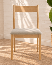Load image into Gallery viewer, Nola dining chair with natural rubberwood frame, gray upholstered seat, curved wood backrest, and tapered legs
