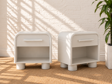 Load image into Gallery viewer, Pair of Vivienne soft white one drawer nightstands with curved corners, open lower shelves and rounded feet
