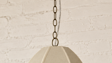 Load image into Gallery viewer, Penny hanging lamp in sand cotton rope with an elongated oval shade, raised vertical ribs, iron frame, and chain suspension.
