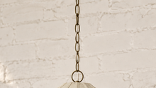 Load image into Gallery viewer, Poppy hanging lamp in sand with a rounded sculptural shade, textured surface, vertical rib detailing, and metal chain suspension.
