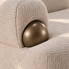 Load image into Gallery viewer, Quentin ivory gray upholstered accent chair with rounded arms, textured fabric and antique brass-finished metal accents.
